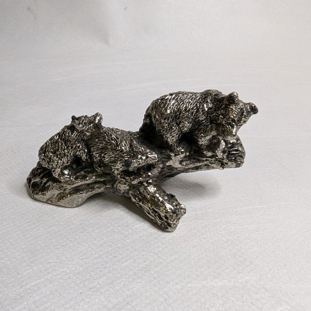 Bears on a log