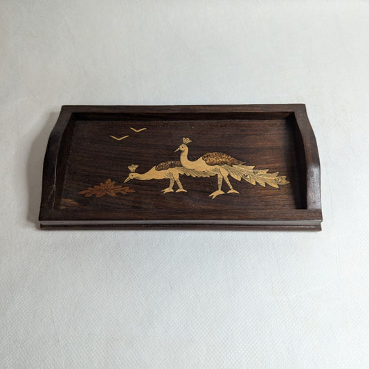 Tablet mit Pfau