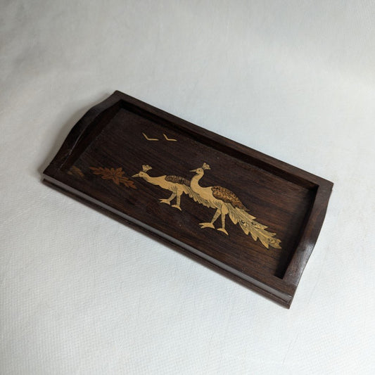 Tablet mit Pfau