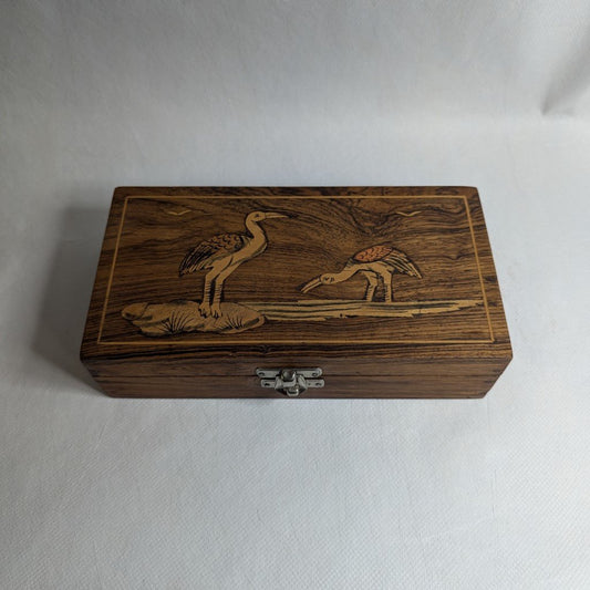 Holzbox mit Reiher